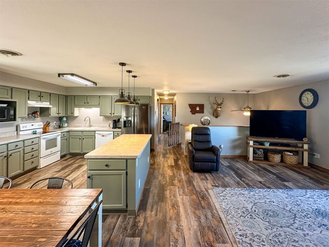 Open concept kitchen/living/dining | Image 28