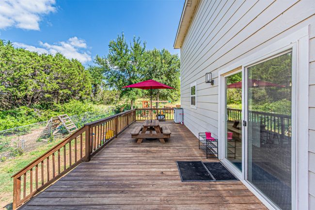 Wooden deck with outdoor dining space | Image 35