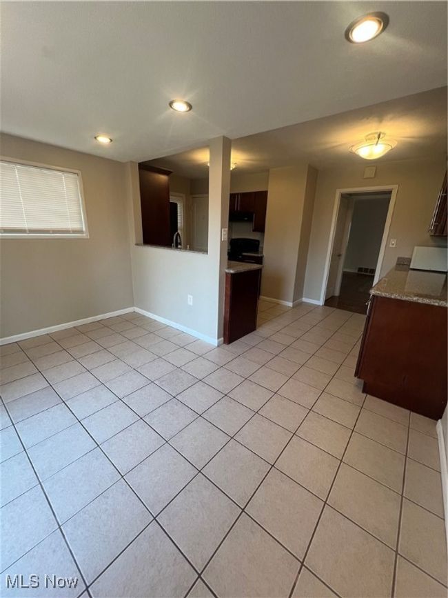 View of tiled eat-in Kitchen | Image 13