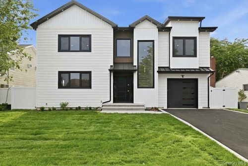 24 Middle Ln, Westbury, NY, 11590-6308 | Card Image