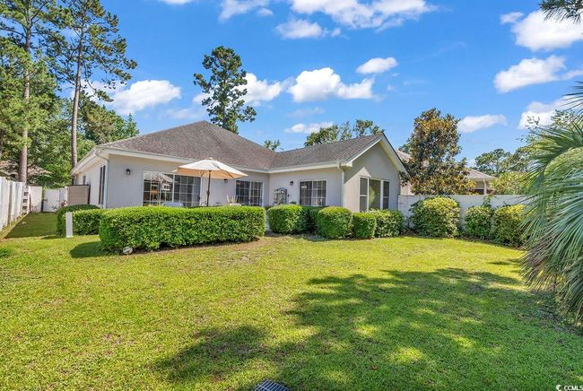 Rear view of property featuring stucco siding | Image 26