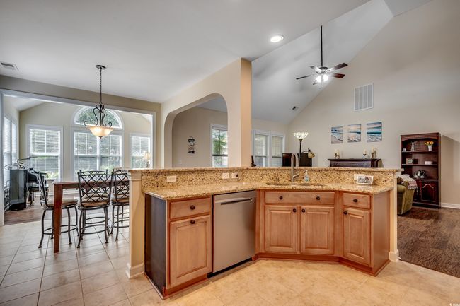 Tile flooring and open to breakfast room | Image 9