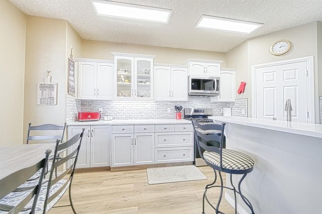 149 Bow Ridge Cres, House detached with 3 bedrooms, 3 bathrooms and 4 parking in Cochrane AB | Image 12