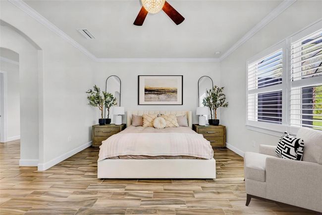 Primary Bedroom has attached office area, ensuite bathroom with 2 large walk-in closets | Image 34
