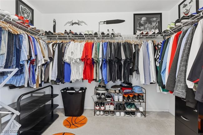 Walk in closet with carpet floors | Image 50
