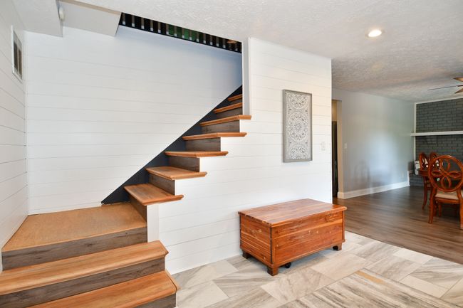 Front foyer leading to dining room on circular floor plan | Image 7
