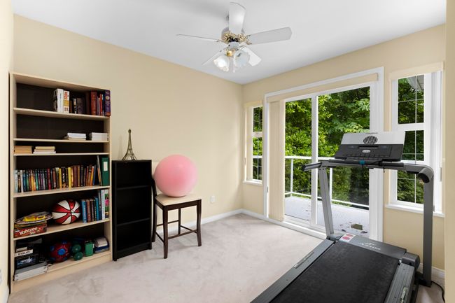Exercise area featuring carpet and ceiling fan | Image 24