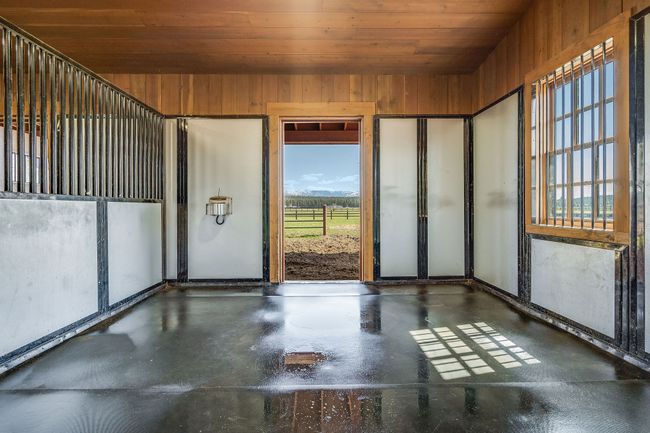 Interior of stall showing custom padded flooring | Image 98