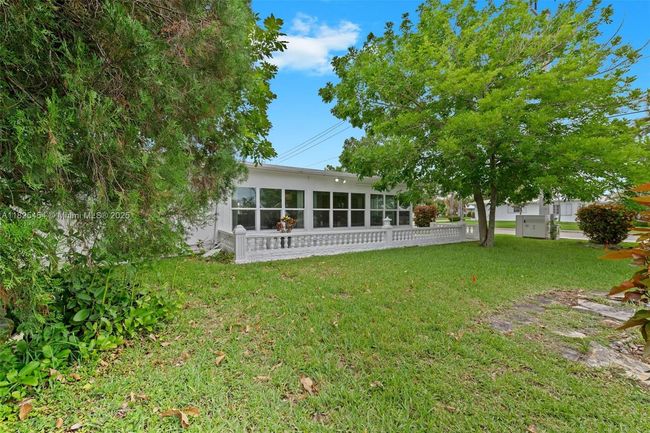6905 Nw 73 Rd St, House other with 2 bedrooms, 2 bathrooms and null parking in Tamarac FL | Image 22