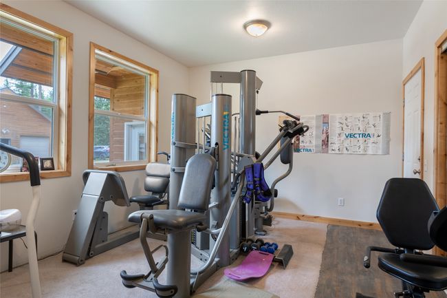 Workout room featuring baseboards | Image 53