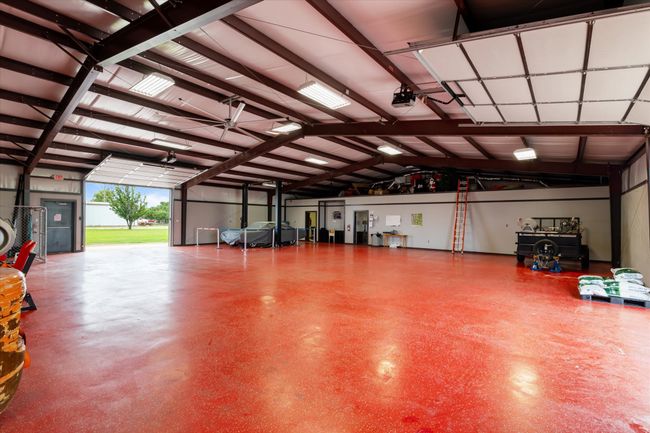 Garage featuring a garage door opener | Image 17