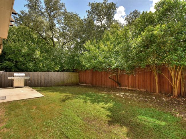Fenced backyard. | Image 24
