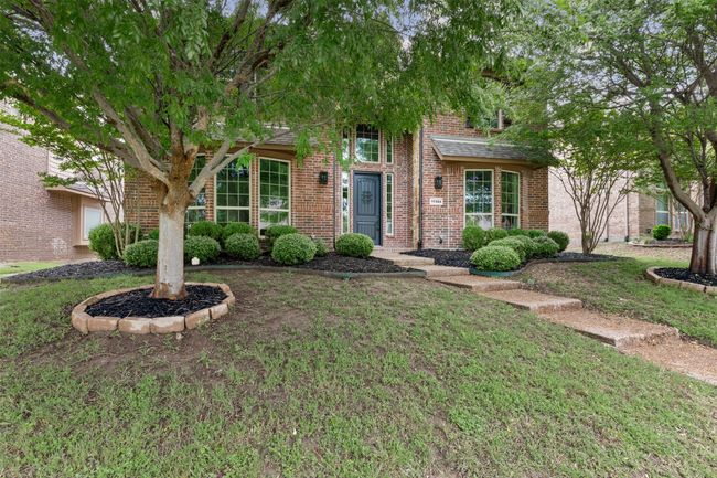 Obstructed view of property featuring a front lawn and brick siding | Image 40