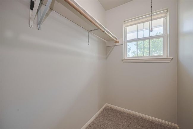 Very large walk in closet with window | Image 30