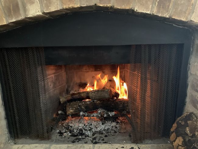 Real wood burning fireplace with a hearth. | Image 4