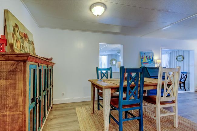 24. Dining Area (8' x 10') Feels Spacious.. It Opens to Kitchen & Living Room.. Providing an Open Concept Great Room! A+ Furnishings! | Image 24