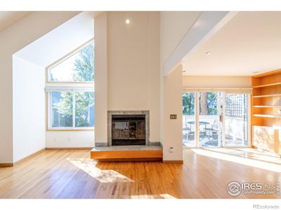 Soaring ceilings and windows bring the outside in and fill the home with sun. | Image 3