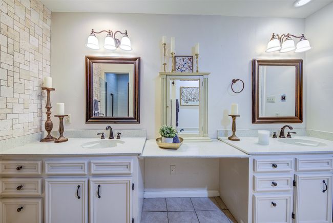 Bathroom featuring double vanity and tile patterned floors | Image 19
