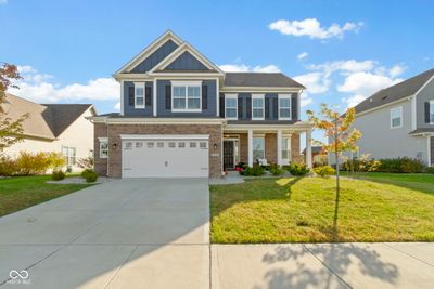 Great covered front porch for outdoor living space. | Image 2