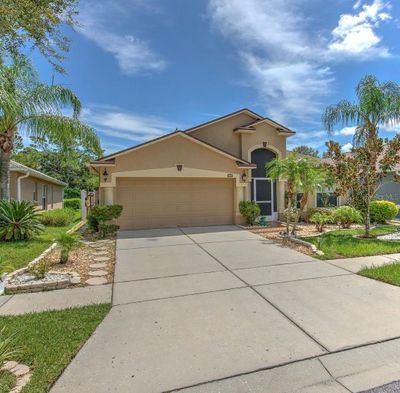 7254 Parkersburg Drive, House other with 4 bedrooms, 3 bathrooms and null parking in Wesley Chapel FL | Image 2