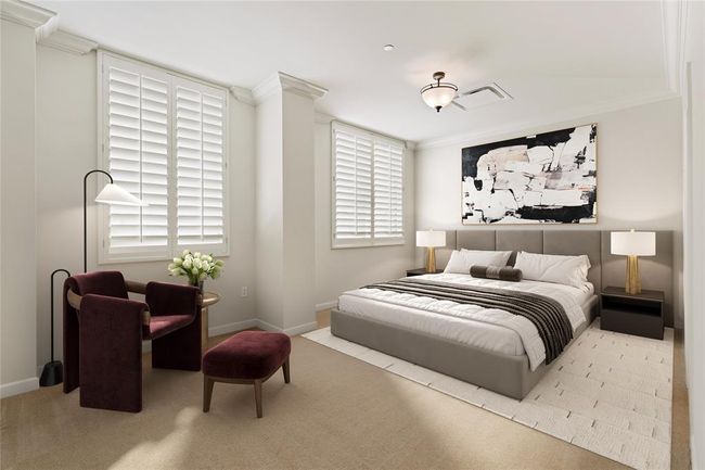 Primary suite with neutral tones, custom shutters and room for a sitting area. Image shown virtually staged. | Image 5