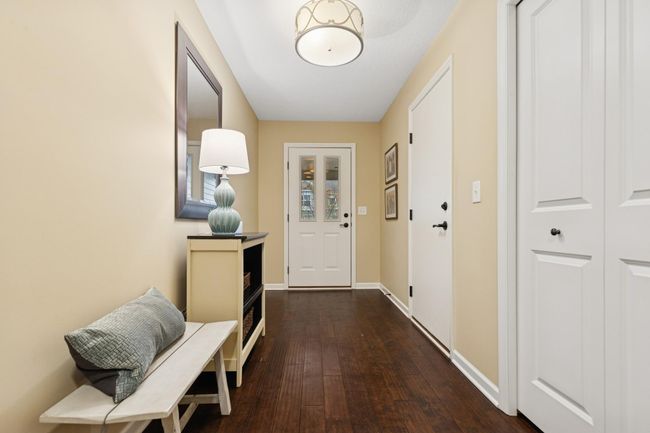 Plenty of room for a bench, boots, coats, etc. in this front entrance + convenient closet! | Image 22