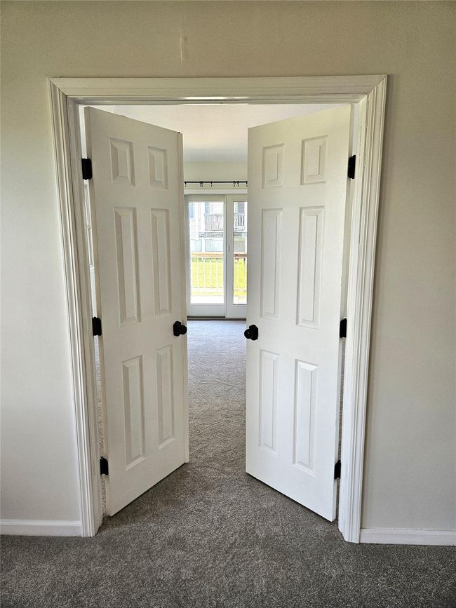 An Elegant, Double Door Entrance Leads To The Large, Inviting Primary Bedroom Suite With It's Own Private Bathroom & Large Walk In Closet. | Image 8