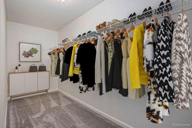 Virtually staged- primary closet | Image 30