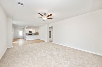 Spacious living room, open to the kitchen and dining area. | Image 3