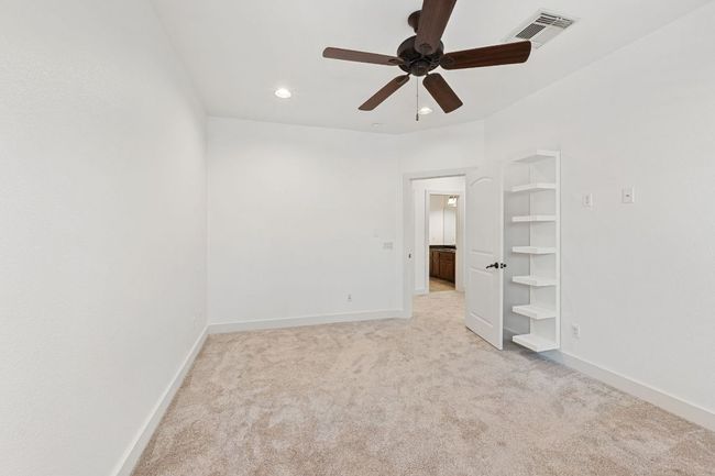 Unfurnished bedroom with carpet flooring, recessed lighting, and ceiling fan | Image 22