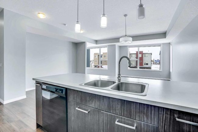201 - 70 Saddlestone Dr Ne, Townhouse with 2 bedrooms, 3 bathrooms and 1 parking in Calgary AB | Image 37