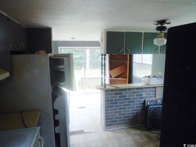 Kitchen featuring tile patterned floors | Image 9