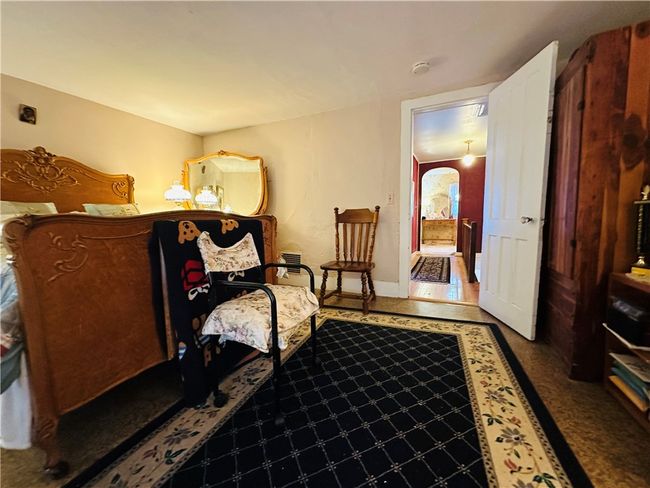 Unit 1 - Bedroom 2 - Looking down the hallway towards the bathroom | Image 15