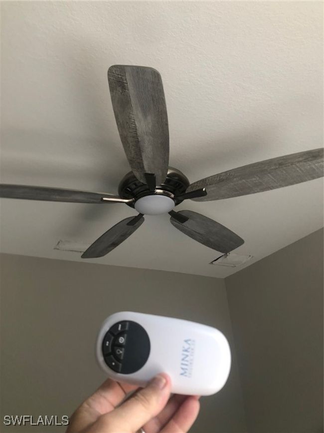 Interior details featuring ceiling fan | Image 22