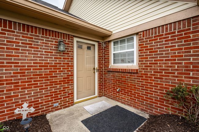entrance to property with brick siding | Image 6