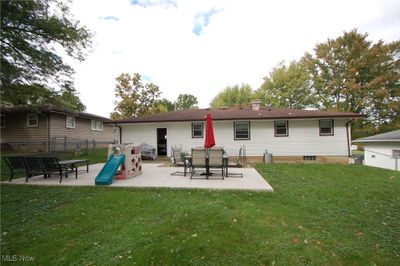 Back of house with a lawn and a patio area | Image 2