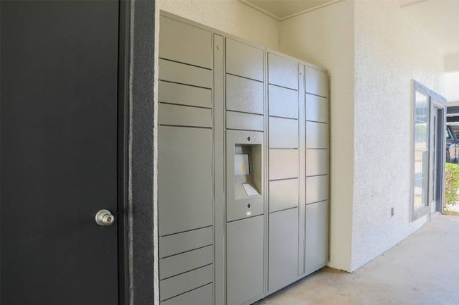 View of property's community with a package area | Image 10