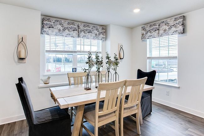 Spacious eating area conveniently located right off the kitchen. Model picture shown. Colors and finishes may vary. | Image 6