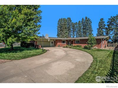 Welcome to This All-Brick, Mid-Century Ranch-style Home | Image 1