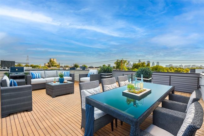 Wooden deck featuring outdoor lounge area | Image 6