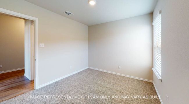 Carpeted spare room with baseboards | Image 21