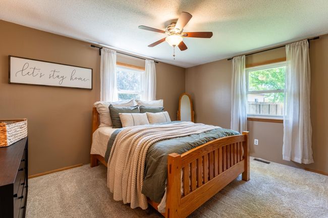 There are 2 bedrooms on the main level. Both have new Dreamweaver "Stunning" mid-weight carpet professionally installed. | Image 18