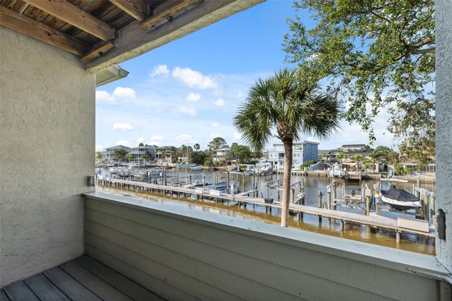 second floor balcony overlooking water | Image 36