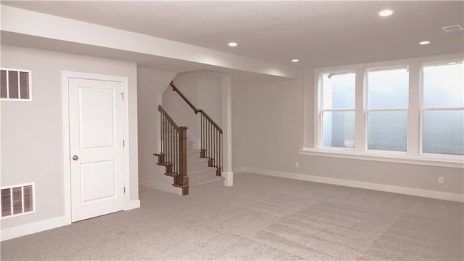 Basement with baseboards, visible vents, and recessed lighting | Image 48