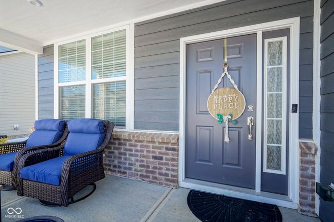 doorway to property with covered porch | Image 5