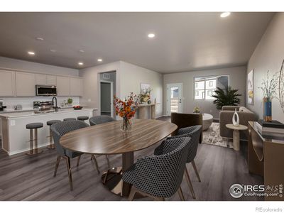 VIRTUALLY STAGED DINING, KITCHEN, AND LIVING ROOM | Image 3