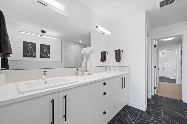 136 Carringvue Pl Nw, House other with 3 bedrooms, 3 bathrooms and 4 parking in Calgary AB | Image 28