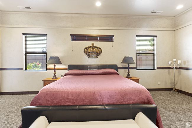 Carpeted bedroom featuring baseboards | Image 27