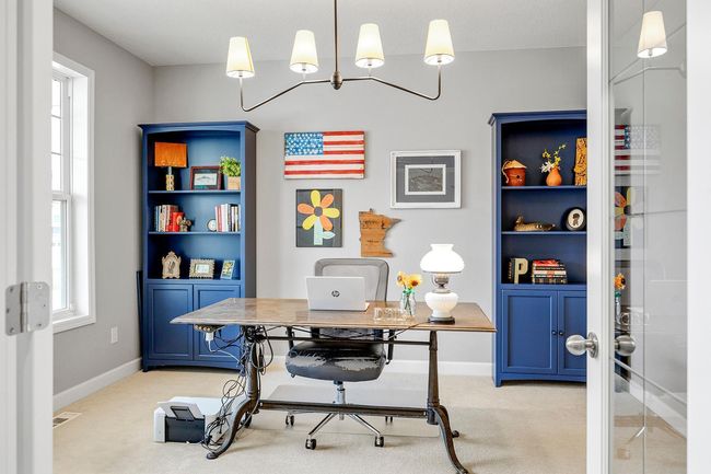 A dedicated main-floor office provides a quiet space for work or study! | Image 19