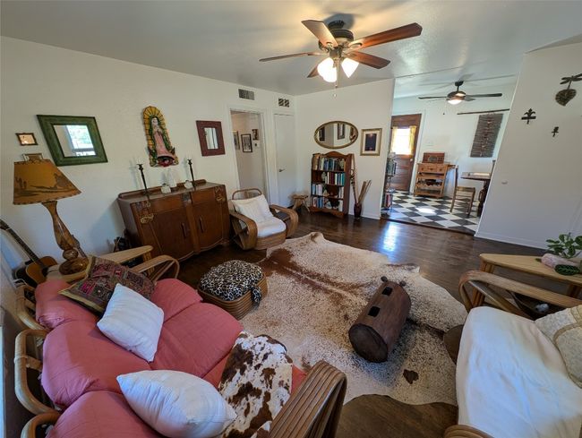 Living has ample space and good lighting. | Image 8